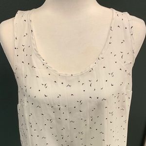 White racer-back silk blouse with bird pattern